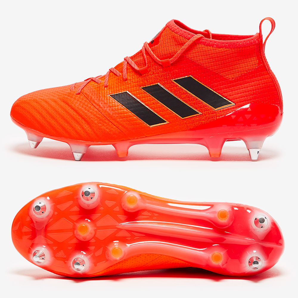 Orange adidas top football boots