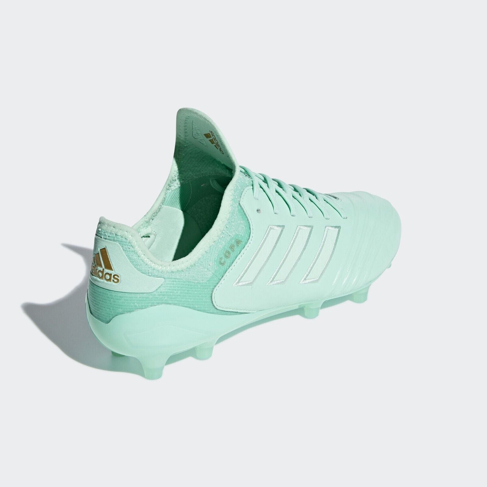 Mint green hot sale football boots